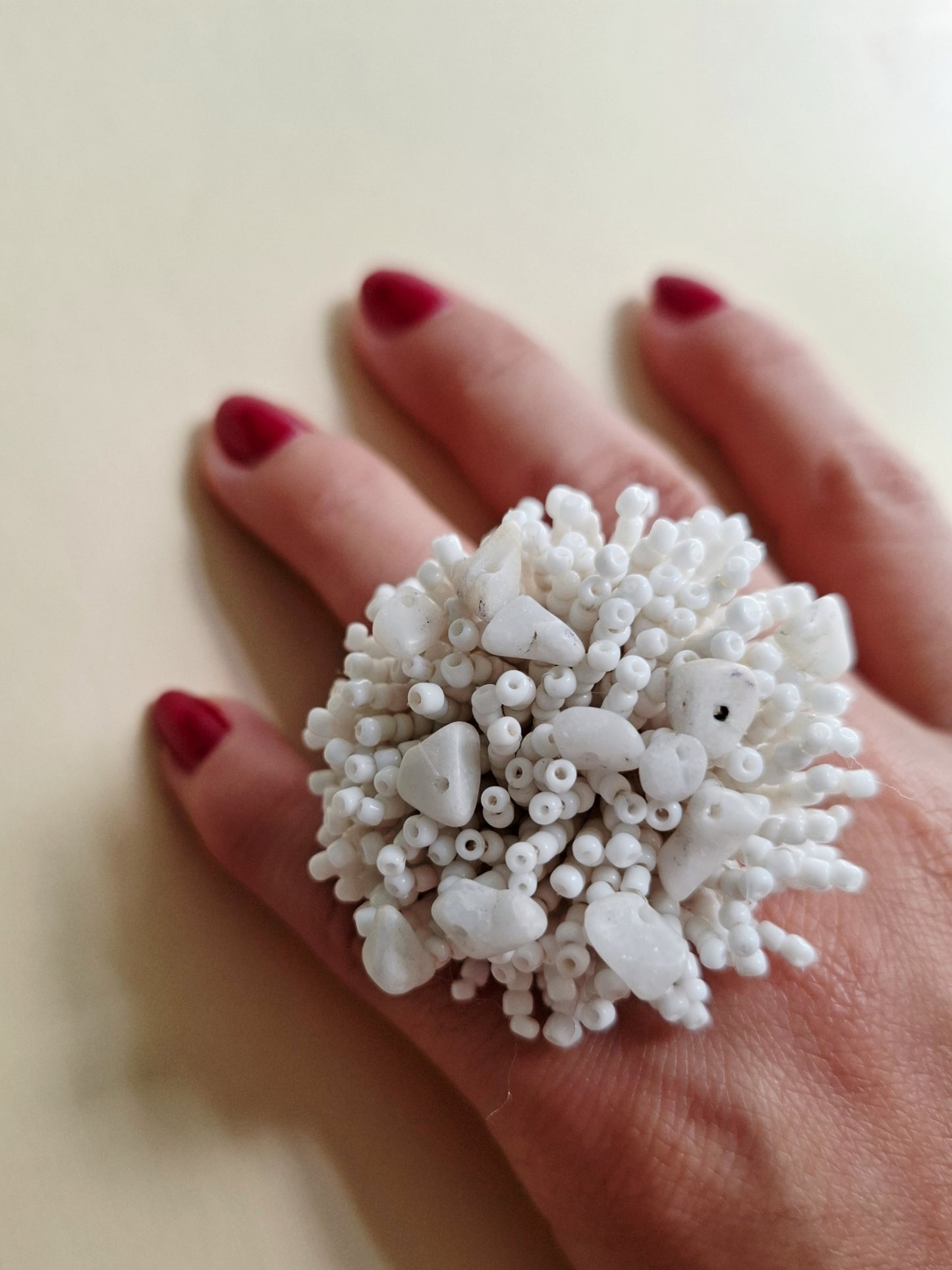 Anillo de pompón