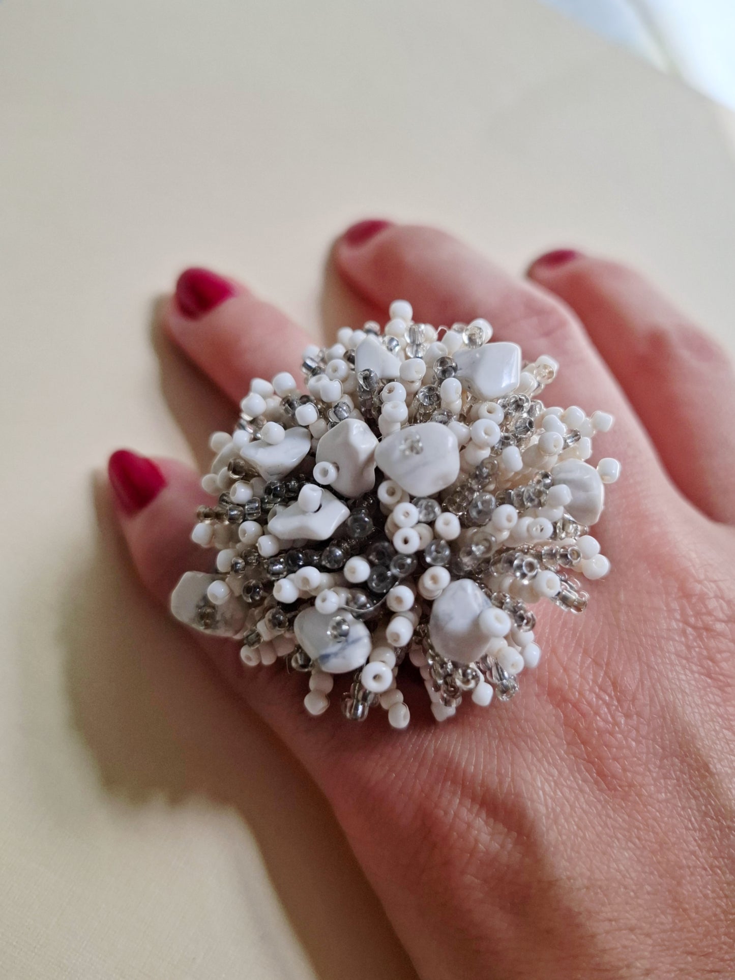 Anillo de pompón