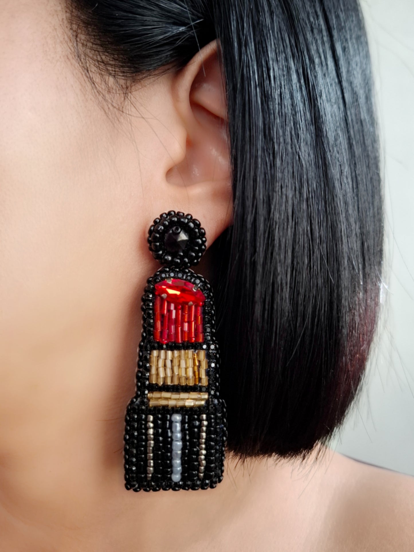 Pendientes de lápiz labial