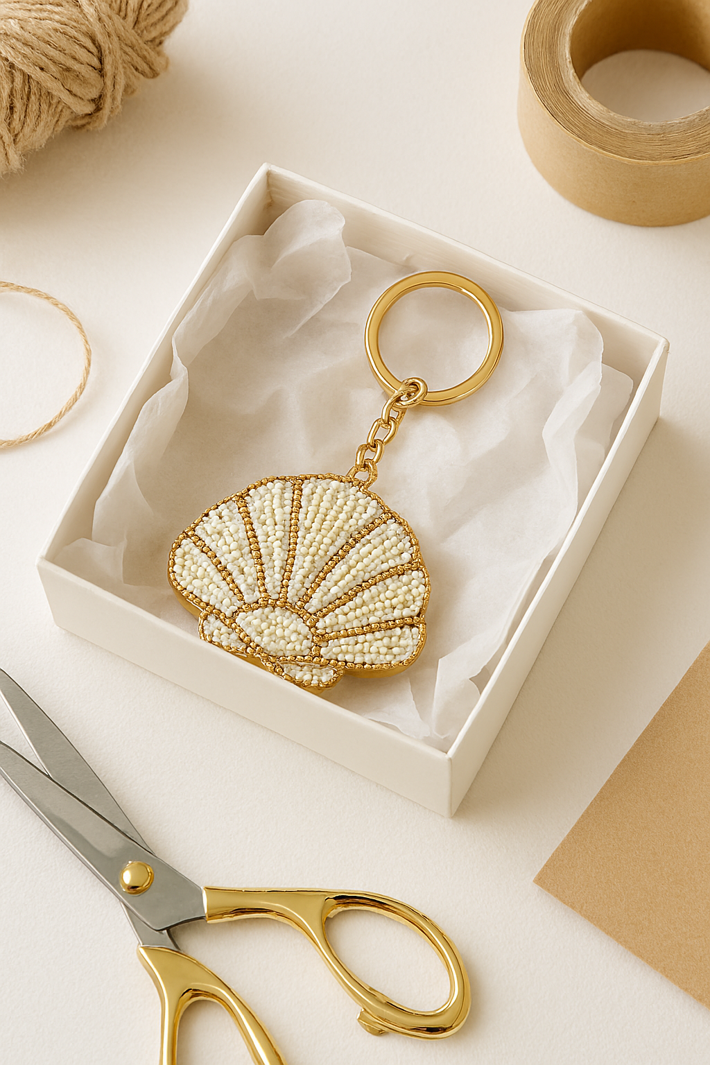 Charm para bolso con forma de concha marina