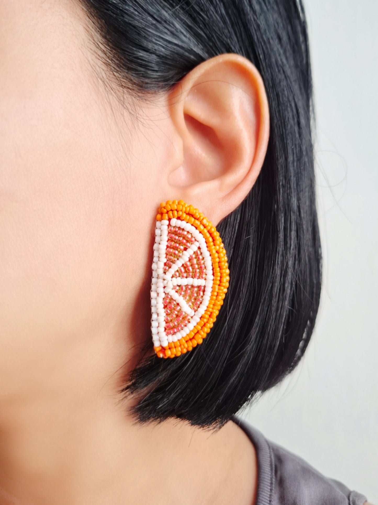 Pendientes de naranjas