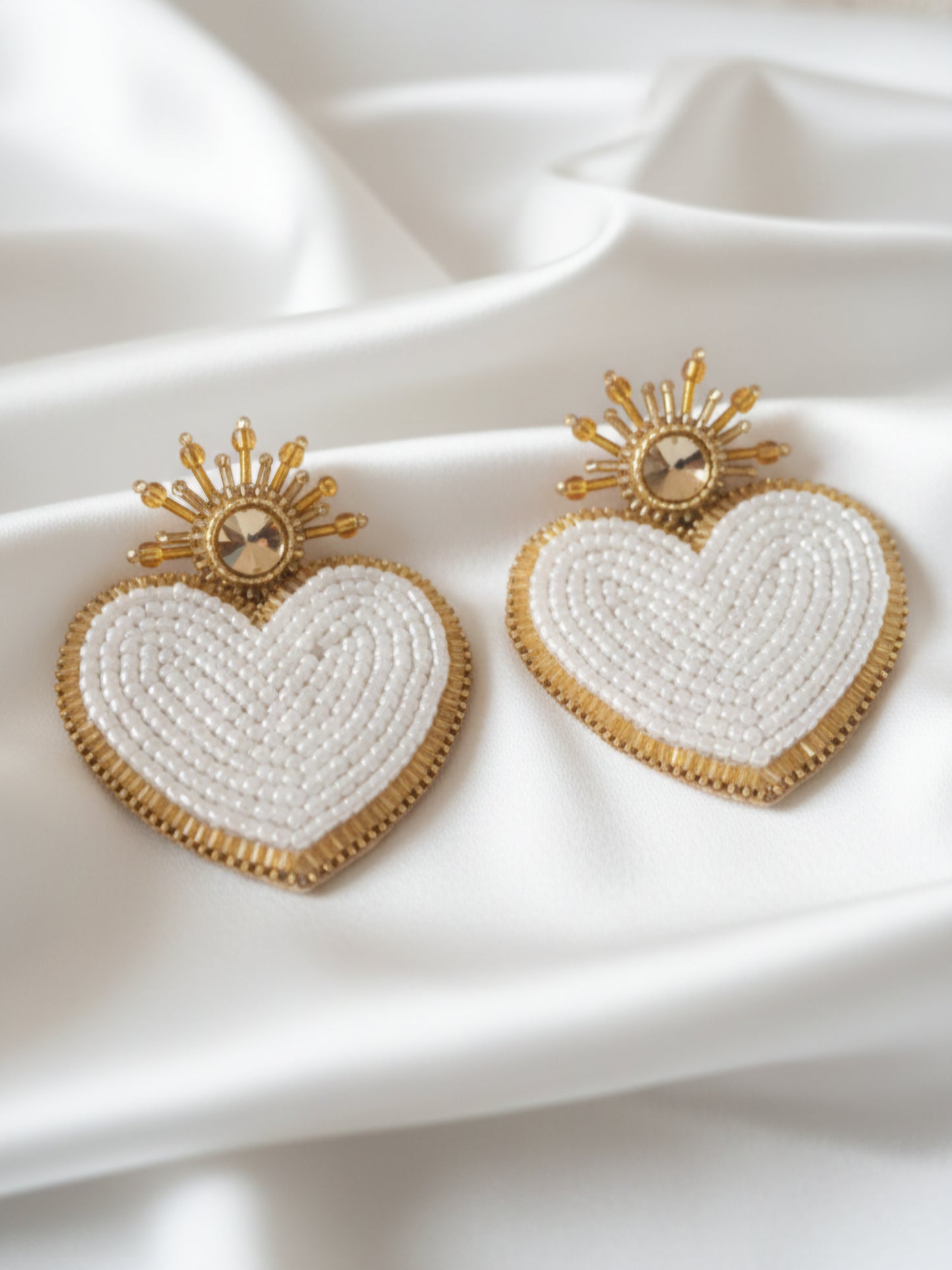 Pendientes de corazones de Venus