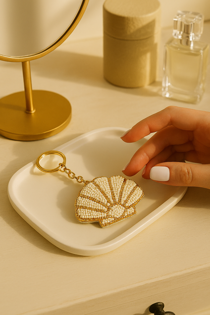 Charm para bolso con forma de concha marina