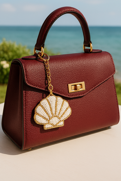 Charm para bolso con forma de concha marina